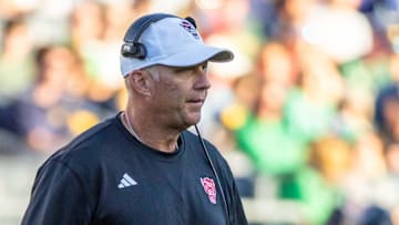 Oct 11, 2025; South Bend, Indiana, USA; NC State Wolfpack head coach Dave Doeren walks on the field against the Notre Dame Fighting Irish during the second half at Notre Dame Stadium. Mandatory Credit: Michael Caterina-Imagn Images
