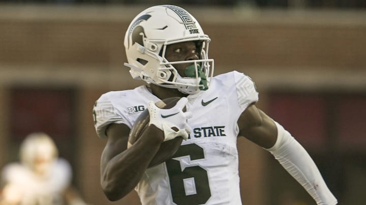 Sep 7, 2024; College Park, Maryland, USA; Michigan State Spartans wide receiver Nick Marsh (6) runs for a touchdown after a catch during the second half  against the Maryland Terrapins at SECU Stadium. Mandatory Credit: Tommy Gilligan-Imagn Images