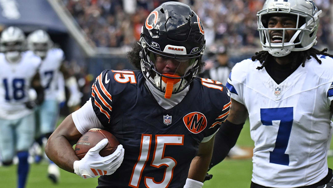 Sep 21, 2025; Chicago, Illinois, USA; Chicago Bears wide receiver Rome Odunze (15) catches a touchdown pass against Dallas Cowboys wide receiver Traeshon Holden (7) during the first half at Soldier Field. Sep 21, 2025; Chicago, Illinois, USA; Chicago Bears wide receiver Rome Odunze (15) catches a touchdown pass against Dallas Cowboys wide receiver Traeshon Holden (7) during the first half at Soldier Field.