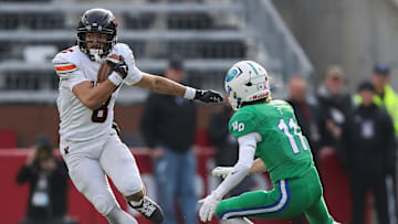 West De Pere High School's Judeah Kniskern (8) jukes past Notre Dame Academy's Jonah Marzec (11) during the WIAA Division 2 state championship football game on Friday, November 21, 2025, at Camp Randall Stadium in Madison, Wis. Tork Mason/USA TODAY NETWORK-Wisconsin