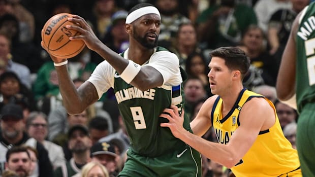 Milwaukee Bucks forward Bobby Portis looks for a shot against Indiana Pacers forward Doug McDermott in 2023-24.