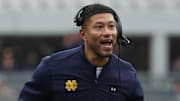 Nov 15, 2025; Pittsburgh, Pennsylvania, USA;  Notre Dame Fighting Irish head coach Marcus Freeman reacts after an Irish touchdown against the Pittsburgh Panthers during the second quarter at Acrisure Stadium. 