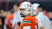 Miami Hurricanes quarterback Carson Beck warms up before the game against NC State Wolfpack at Hard Rock Stadium.