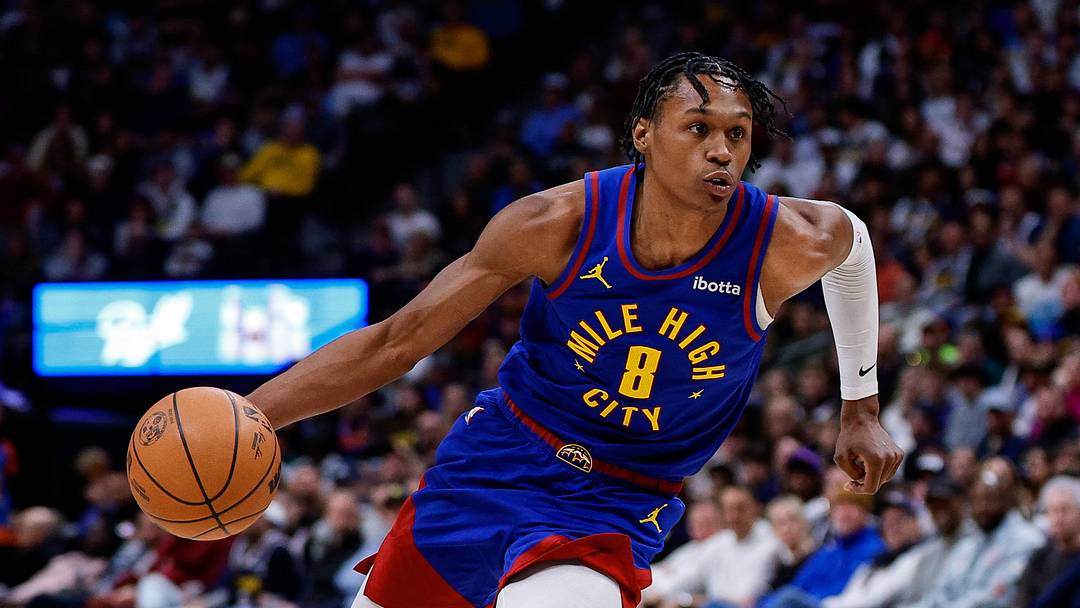 Feb 1, 2026; Denver, Colorado, USA; Denver Nuggets guard Peyton Watson (8) controls the ball in the third quarter against the Oklahoma City Thunder at Ball Arena. Mandatory Credit: Isaiah J. Downing-Imagn Images
