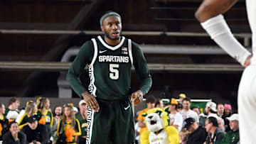 Michigan State's Tre Holloman waits for a teammate taking free throws during the second half of the Superior Dome Showdown on Sunday, Oct. 13.