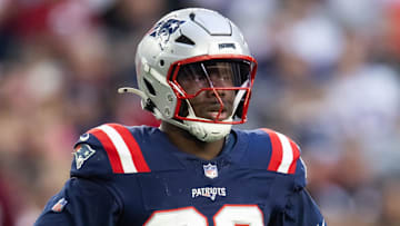 Dec 15, 2024; Glendale, Arizona, USA; New England Patriots defensive end Keion White (99) against the Arizona Cardinals at State Farm Stadium. Mandatory Credit: Mark J. Rebilas-Imagn Images
