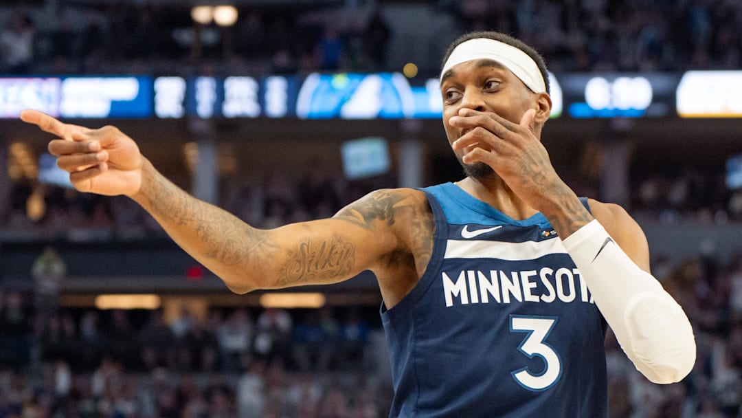 Apr 27, 2025; Minneapolis, Minnesota, USA; Minnesota Timberwolves forward Jaden McDaniels (3) celebrates a three pointer made against the Los Angeles Lakers in the third quarter during game four of first round for the 2025 NBA Playoffs at Target Center. Mandatory Credit: Matt Blewett-Imagn Images