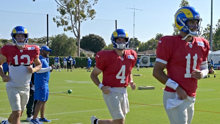 Los Angeles Rams quarterbacks Stetson Bennett (13), Dresser Winn (4), and Jimmy Garoppolo (11). Mandatory Credit: Jayne Kamin-Oncea-Imagn Images