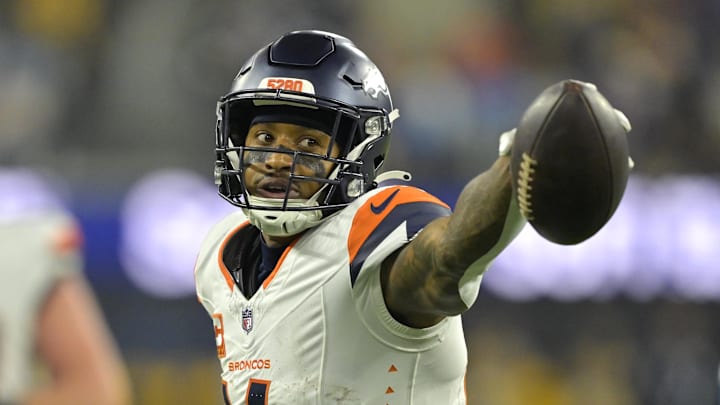 Broncos wide receiver Courtland Sutton scores a first down. Broncos wide receiver Courtland Sutton scores a first down.