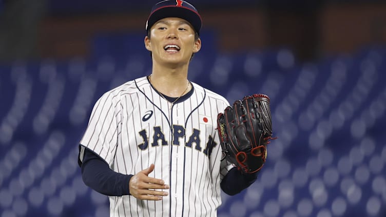 Aug 4, 2021; Yokohama, Japan; Team Japan pitcher Yoshinobu Yamamoto (17) reacts against Korea in a