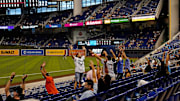 Apr 1, 2021; Miami, Florida, USA; Miami Marlins fans attempt to start the wave in the 8th inning between the Miami Marlins and the Tampa Bay Rays at loanDepot park.