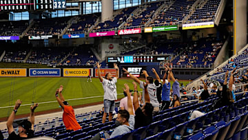 Apr 1, 2021; Miami, Florida, USA; Miami Marlins fans attempt to start the wave in the 8th inning between the Miami Marlins and the Tampa Bay Rays at loanDepot park.