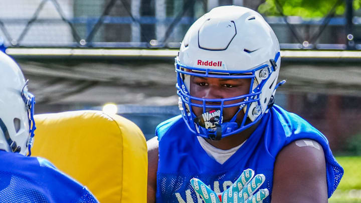 Defensive lineman Neeko Rodgers works on a drill during football practice at Catholic Memorial High School on Wednesday, August 7, 2024. Defensive lineman Neeko Rodgers works on a drill during football practice at Catholic Memorial High School on Wednesday, August 7, 2024.