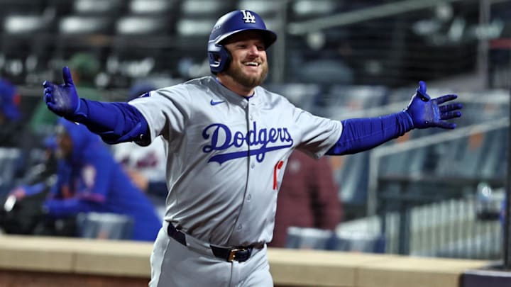 Oct 16, 2024; New York City, New York, USA; Los Angeles Dodgers third base Max Muncy (13) reacts after hitting a home run against the New York Mets in the ninth inning during game three of the NLCS for the 2024 MLB playoffs at Citi Field. Mandatory Credit: Wendell Cruz-Imagn Images