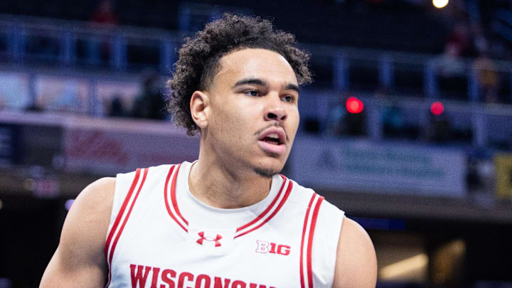 Mar 13, 2025; Indianapolis, IN, USA; Wisconsin Badgers guard John Tonje (9) celebrates a made basket  in the second half against the Northwestern Wildcats at Gainbridge Fieldhouse. Mandatory Credit: Trevor Ruszkowski-Imagn Images