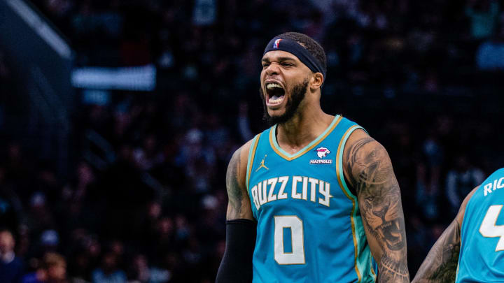 Apr 7, 2024; Charlotte, North Carolina, USA; Charlotte Hornets forward Miles Bridges (0) celebrates after scoring against the Oklahoma City Thunder during the fourth quarter at Spectrum Center. Mandatory Credit: Scott Kinser-USA TODAY Sports