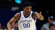 Nov 21, 2025; Lexington, Kentucky, USA; Kentucky Wildcats guard Otega Oweh (00) reacts after making a three point basket during the first half against the Loyola (MD) Greyhounds at Rupp Arena at Central Bank Center. Mandatory Credit: Jordan Prather-Imagn Images