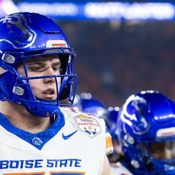 Dec 31, 2024; Glendale, AZ, USA; Boise State Broncos offensive tackle Kage Casey (77) against the Penn State Nittany Lions during the Fiesta Bowl at State Farm Stadium. Mandatory Credit: Mark J. Rebilas-Imagn Images