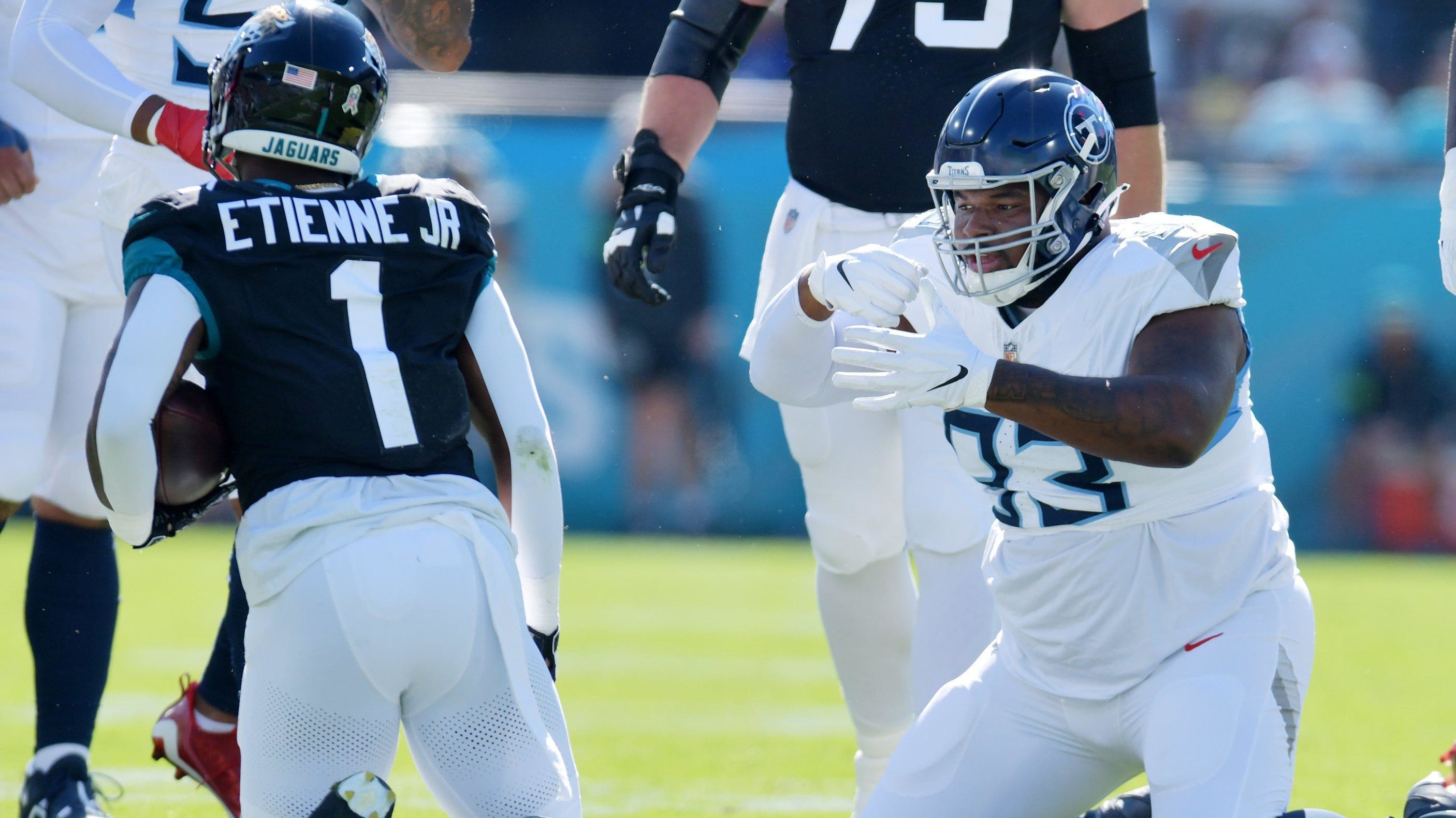 Tennessee Titans Teair Tart (93) makes an eating motion after a late first quarter tackle on