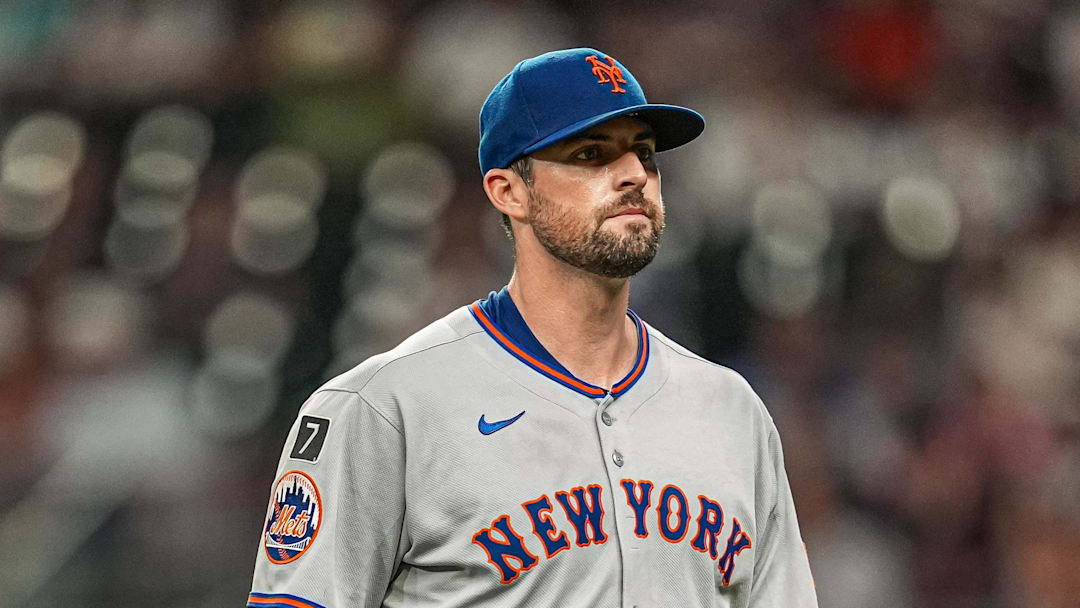 Aug 23, 2025; Cumberland, Georgia, USA; New York Mets starting pitcher Clay Holmes (35) leaves the field after being removed from the game against the Atlanta Braves during the seventh inning at Truist Park. Mandatory Credit: Dale Zanine-Imagn Images