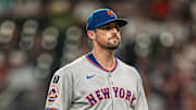 Aug 23, 2025; Cumberland, Georgia, USA; New York Mets starting pitcher Clay Holmes (35) leaves the field after being removed from the game against the Atlanta Braves during the seventh inning at Truist Park. Mandatory Credit: Dale Zanine-Imagn Images