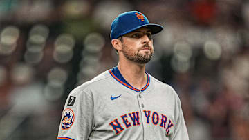 Aug 23, 2025; Cumberland, Georgia, USA; New York Mets starting pitcher Clay Holmes (35) leaves the field after being removed from the game against the Atlanta Braves during the seventh inning at Truist Park. Mandatory Credit: Dale Zanine-Imagn Images