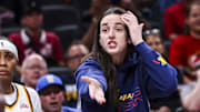 Jun 26, 2025; Indianapolis, Indiana, USA; Indiana Fever guard Caitlin Clark (22) reacts to the action against the Los Angeles Sparks during the first half at Gainbridge Fieldhouse. Mandatory Credit: Grace Smith/INDIANAPOLIS STAR-Imagn Images