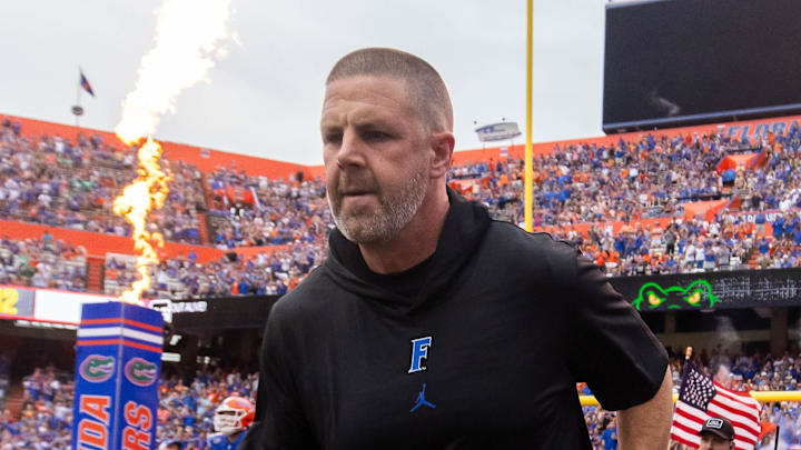 Florida Gators head coach Billy Napier runs onto the field before the start of the game at Ben Hill Griffin Stadium in Gainesville, FL on Saturday, September 7, 2024 against the Samford Bulldogs. The Gators won 45-7. [Doug Engle/Gainesville Sun]