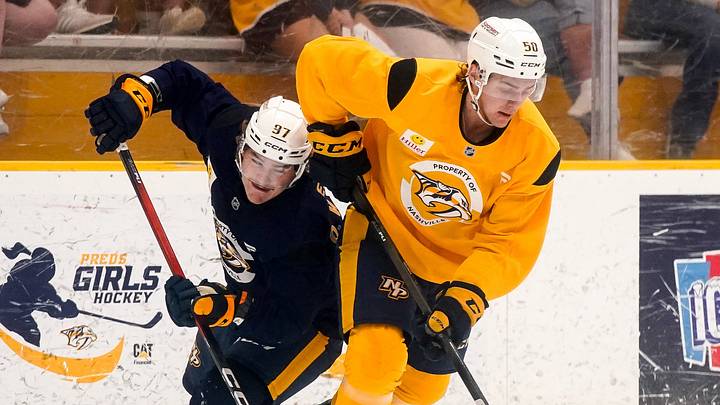 Gold team defenseman Tanner Molendyk (50) battles Blue team forward Oasiz Wiesblatt (97) during the Future Stars Game at the Ford Ice Center Bellevue in Nashville, Tenn., Saturday, July 5, 2025.