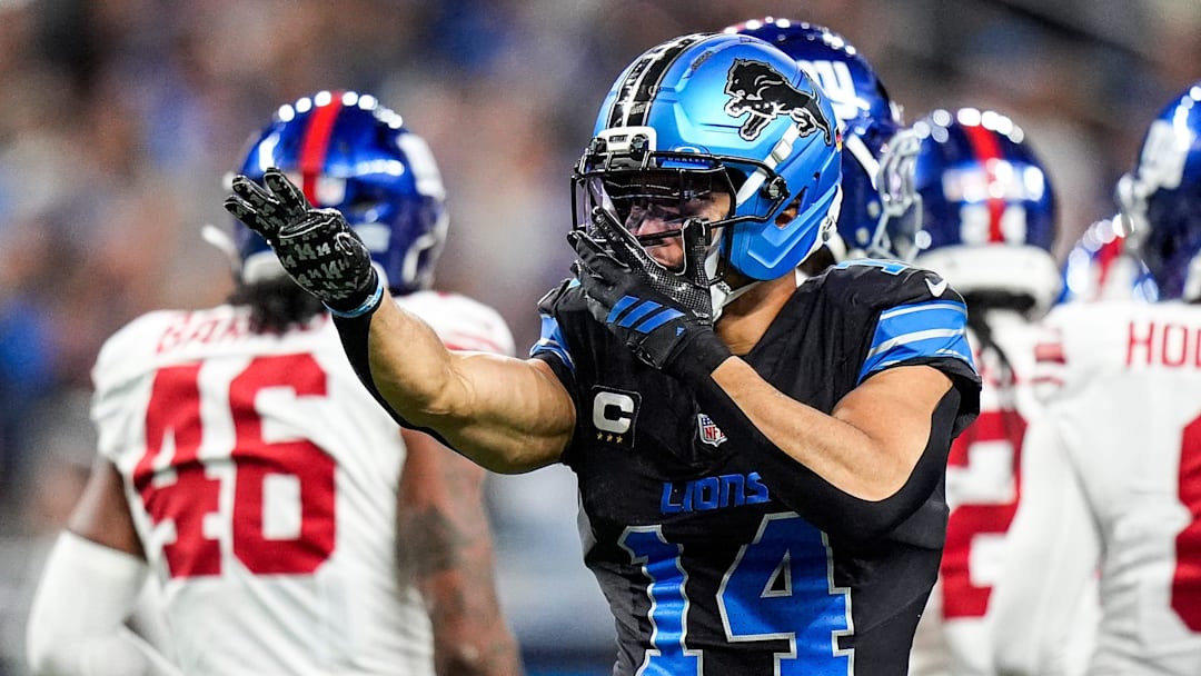 Detroit Lions wide receiver Amon-Ra St. Brown (14) celebrates a first down against New York Giants during the first half at Ford Field in Detroit on Sunday, Nov. 23, 2025.