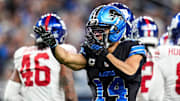 Detroit Lions wide receiver Amon-Ra St. Brown (14) celebrates a first down against New York Giants during the first half at Ford Field in Detroit on Sunday, Nov. 23, 2025.