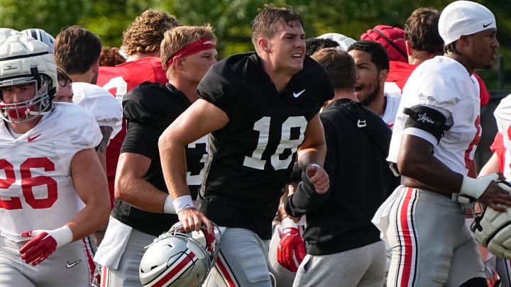 Aug 8, 2024; Columbus, Ohio, USA; Ohio State Buckeyes quarterback Will Howard (18) runs during football practice at the Woody Hayes Athletic Complex.