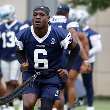 Dallas Cowboys safety Donovan Wilson goes through a drill during practice at the Ford Center at the Star