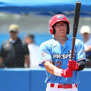 Jun 21, 2019; Bradenton, FL, USA; Team Howard outfielder Austin Hendrick (12) at bat during the eighth inning at IMG Academy. Mandatory Credit: Kim Klement-Imagn Images