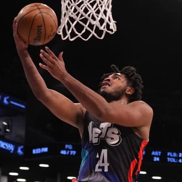 Apr 6, 2024; Brooklyn, New York, USA; Brooklyn Nets shooting guard Cam Thomas (24) shoots a layup against the Detroit Pistons during the second half at Barclays Center. Mandatory Credit: Gregory Fisher-USA TODAY Sports