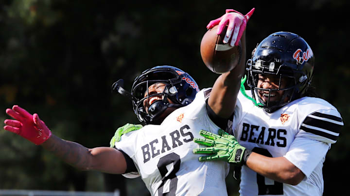 Clairton's Brandon Murphy, left, celebrates with Donte Wright after catching a 37-yard touchdown pass from Jeffrey Thompson Saturday at Riverside Park Oct. 12 in Oakmont. The Bears advance to the PIAA Class A final for the eighth time and will have their third matchup with District 6 champion Bishop Guilfoyle in the final. Clairton's Brandon Murphy, left, celebrates with Donte Wright after catching a 37-yard touchdown pass from Jeffrey Thompson Saturday at Riverside Park Oct. 12 in Oakmont. The Bears advance to the PIAA Class A final for the eighth time and will have their third matchup with District 6 champion Bishop Guilfoyle in the final.