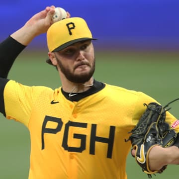 May 23, 2025; Pittsburgh, Pennsylvania, USA;  Pittsburgh Pirates starting pitcher Paul Skenes (30) pitches against the Milwaukee Brewers during the second inning at PNC Park. Mandatory Credit: Charles LeClaire-Imagn Images