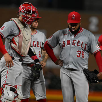 Aug 27, 2024; Detroit, Michigan, USA; Los Angeles Angels starting pitcher Johnny Cueto (36) waits on the mound for manager Ron Washington to pull him from the game after giving up a pair of home runs against the Detroit Tigers in the sixth inning at Comerica Park. Mandatory Credit: Lon Horwedel-USA TODAY Sports