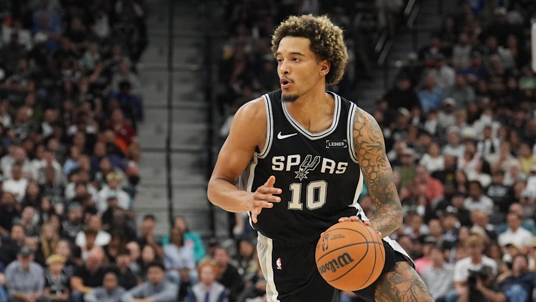 Nov 8, 2025; San Antonio, Texas, USA;  San Antonio Spurs forward Jeremy Sochan (10) dribbles in the second half against the New Orleans Pelicans at Frost Bank Center. Mandatory Credit: Daniel Dunn-Imagn Images