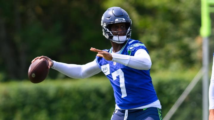 Jul 27, 2024; Renton, WA, USA; Seattle Seahawks quarterback Geno Smith throws during training camp at Virginia Mason Athletic Center. Mandatory Credit: Steven Bisig-USA TODAY Sports