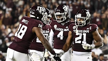 Nov 30, 2024; College Station, Texas, USA; Texas A&M Aggies linebacker Taurean York (21) reacts against the Texas Longhorns during the second half. The Longhorns defeated the Aggies 17-7 at Kyle Field. Mandatory Credit: Maria Lysaker-Imagn Images  
