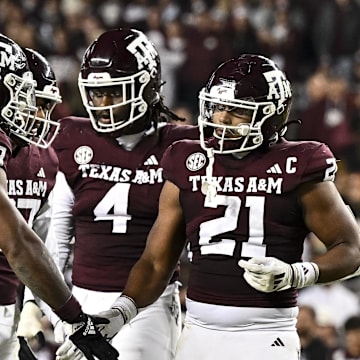 Texas A&M Aggies linebacker Taurean York (21) reacts against the Texas Longhorns during the second half. 