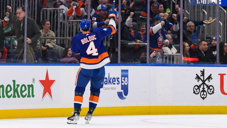 Feb 7, 2023; Elmont, New York, USA;  New York Islanders defenseman Samuel Bolduc (4) celebrates his