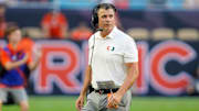 Nov 8, 2025; Miami Gardens, Florida, USA; Miami Hurricanes head coach Mario Cristobal looks at the scoreboard in a game against the Syracuse Orange during the second quarter at Hard Rock Stadium. Mandatory Credit: Jeff Romance-Imagn Images
