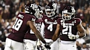 Texas A&M Aggies linebacker Taurean York (21) reacts against the Texas Longhorns during the second half. The Longhorns defeated the Aggies 17-7 at Kyle Field. 