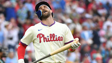 May 4, 2025; Philadelphia, Pennsylvania, USA; Philadelphia Phillies first base Bryce Harper (3) reacts after hitting a flying out to center during the tenth inning against the Arizona Diamondbacks at Citizens Bank Park. Mandatory Credit: Eric Hartline-Imagn Images