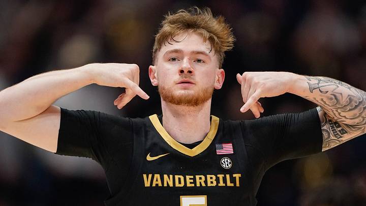 Vanderbilt forward Tyler Nickel (5) celebrates a three-pointer during the first half of the SEC tournament championship game against Arkansas at Bridgestone Arena in Nashville, Tenn., Sunday, March 15, 2026.