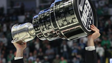 Florida Everblades coach Brad Ralph hoists the Kelly Cup after the Everblades' 4-3 overtime win in game 5 of the ECHL Kelly Cup Finals against the Kansas City Mavericks at Hertz Arena in Estero on June 8, 2024. The Everblades won for the third time in a row.