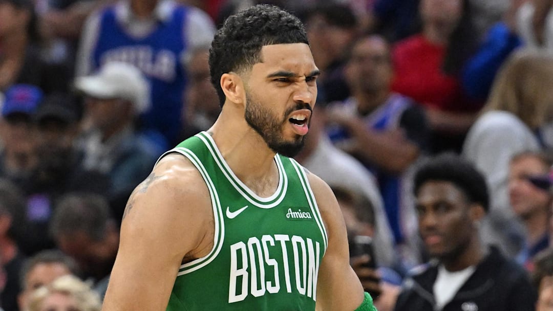 Boston Celtics forward Jayson Tatum (0) celebrates his three point basket against the Philadelphia 76ers late in the fourth quarter at Xfinity Mobile Arena.