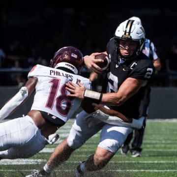 Vanderbilt ’s Diego Pavia runs the ball during Saturday’s game between Vanderbilt and Virginia Tech at FirstBank Stadium in Nashville , Tenn., Saturday, Aug. 31, 2024.